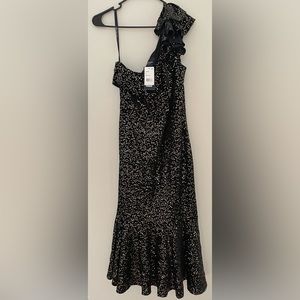 Brand new, never worn with tags.  Beautiful gold sequins on jet black dress